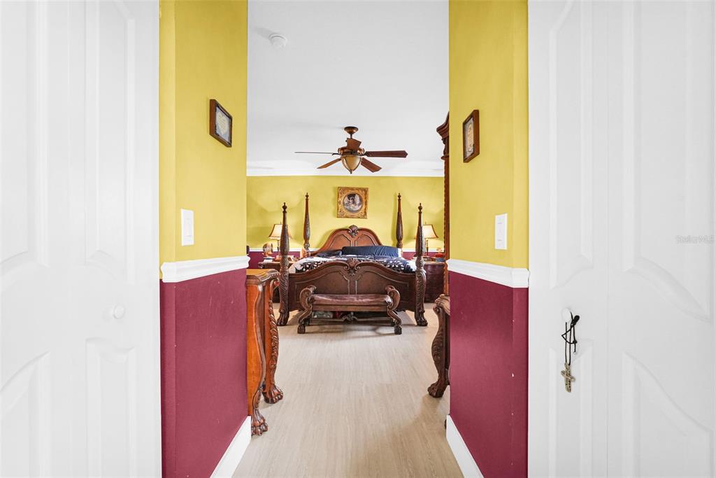 14402 Southwest 157th Path Miami, FL 33196 - Photo 32 of 80 a view of a bedroom with bed and a window