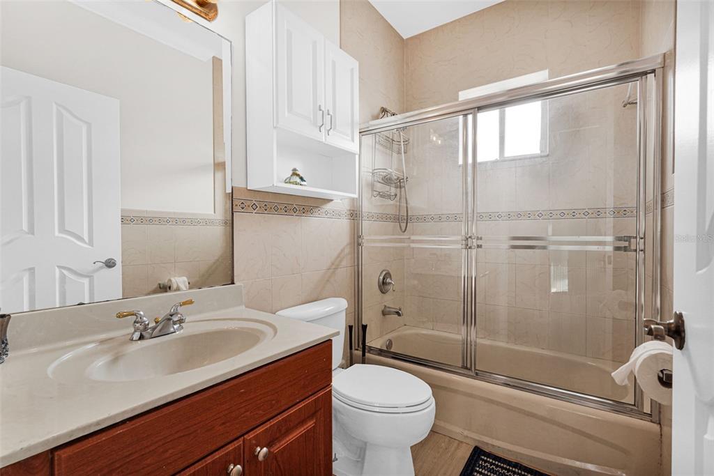 14402 Southwest 157th Path Miami, FL 33196 - Photo 49 of 80 a bathroom with a sink toilet and shower