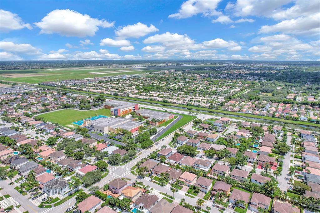 14402 Southwest 157th Path Miami, FL 33196 - Photo 78 of 80 a view of a city with an ocean