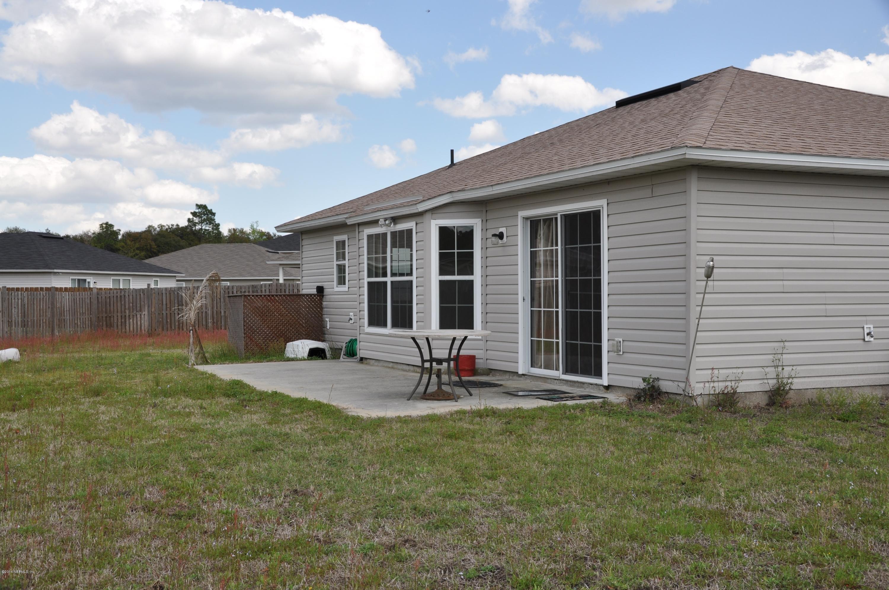 76137 Long Pond Loop Yulee, FL 32097 - Photo 3 of 16 DSC_0346