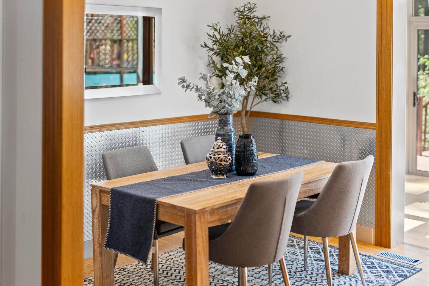 11150 Riverside Road Brookdale, CA 95005 - Photo 15 of 55 a view of table and chair with wooden floor