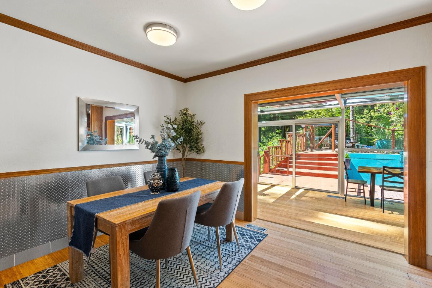 11150 Riverside Road Brookdale, CA 95005 - Photo 16 of 55 a dining room with furniture and a floor to ceiling window