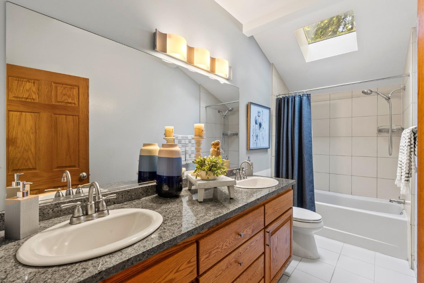 11150 Riverside Road Brookdale, CA 95005 - Photo 35 of 55 a bathroom with a granite countertop sink and a mirror