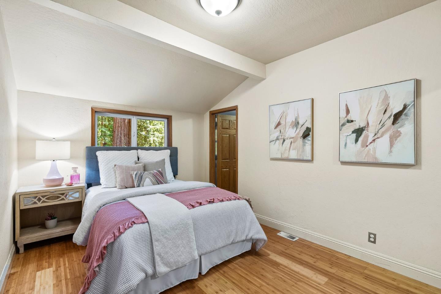 11150 Riverside Road Brookdale, CA 95005 - Photo 36 of 55 a bedroom with a bed and a painting on the wall
