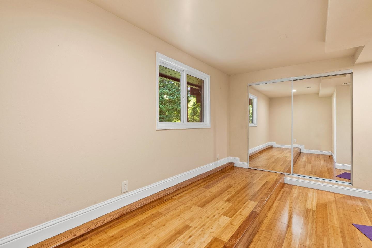 11150 Riverside Road Brookdale, CA 95005 - Photo 42 of 55 a view of an empty room with wooden floor and a window
