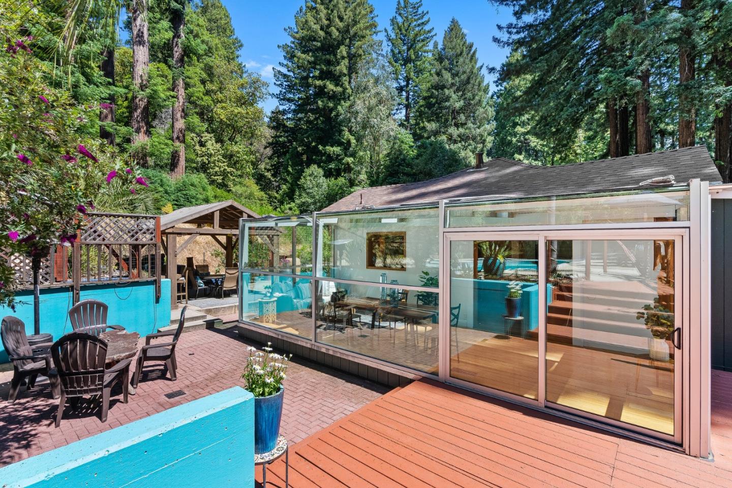 11150 Riverside Road Brookdale, CA 95005 - Photo 52 of 55 a patio with hardwood table and chairs
