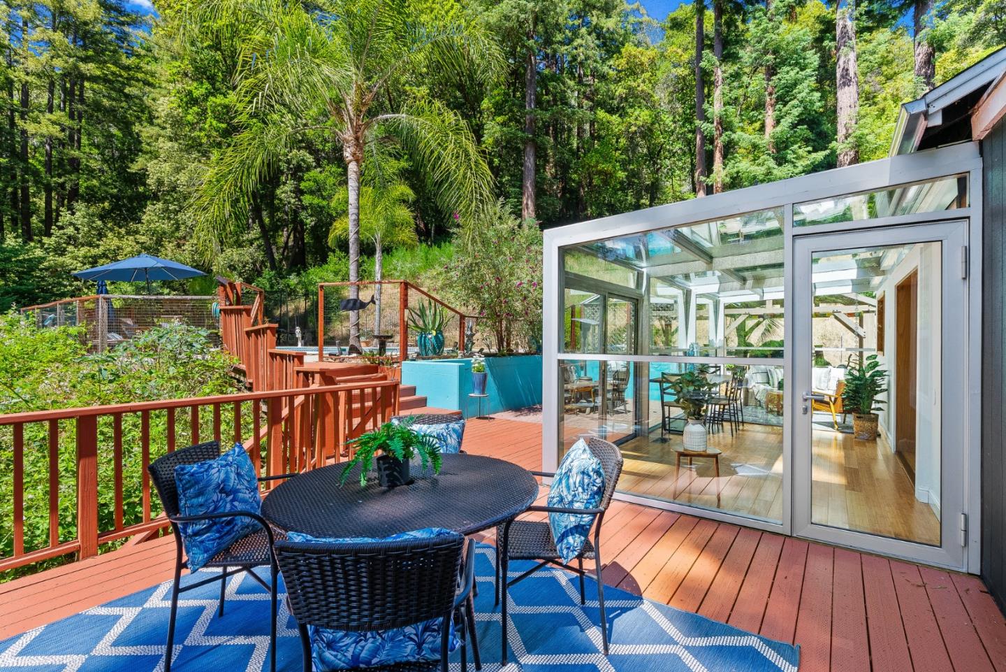 11150 Riverside Road Brookdale, CA 95005 - Photo 53 of 55 a view of a patio with a table chairs and a backyard