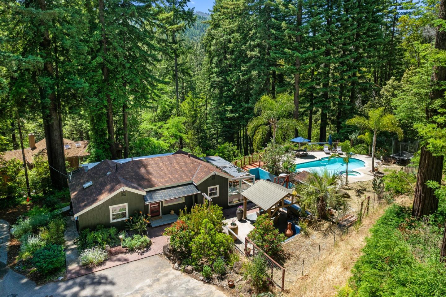 11150 Riverside Road Brookdale, CA 95005 - Photo 8 of 55 an aerial view of a house with swimming pool and garden