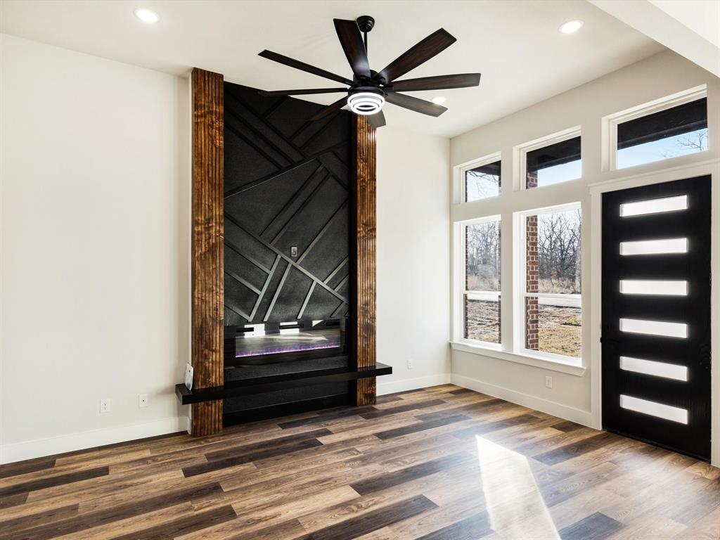 5018 Point La Vista Road Malakoff, TX 75148 - Photo 8 of 32 Unfurnished living room featuring ceiling fan, wood finished floors, and recessed lighting