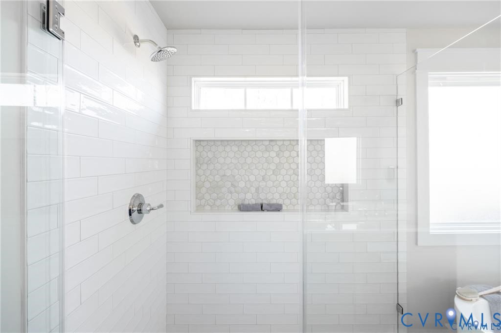 17601 Blue Is Place Moseley, VA 23120 - Photo 26 of 46 a bathroom with a bathtub and shower