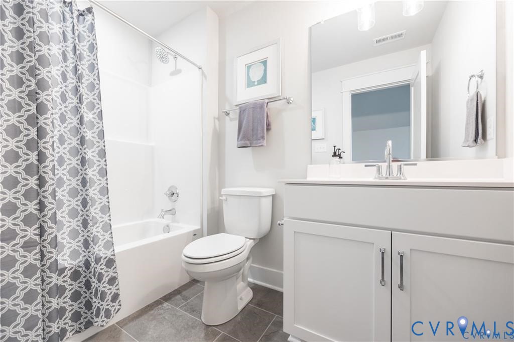 17601 Blue Is Place Moseley, VA 23120 - Photo 29 of 46 a bathroom with a sink toilet and shower