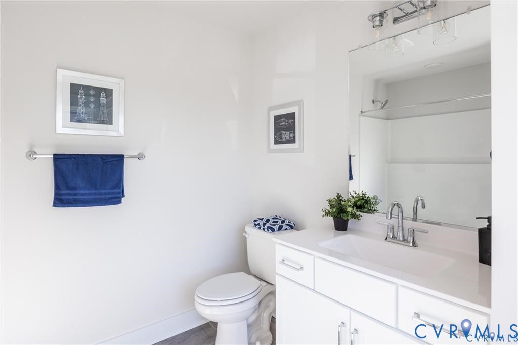 17601 Blue Is Place Moseley, VA 23120 - Photo 32 of 46 a bathroom with a sink toilet and vanity