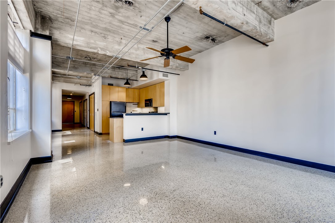 710 Colorado Street, Unit 4J Austin, TX 78701 - Photo 11 of 37 Kitchen open to living