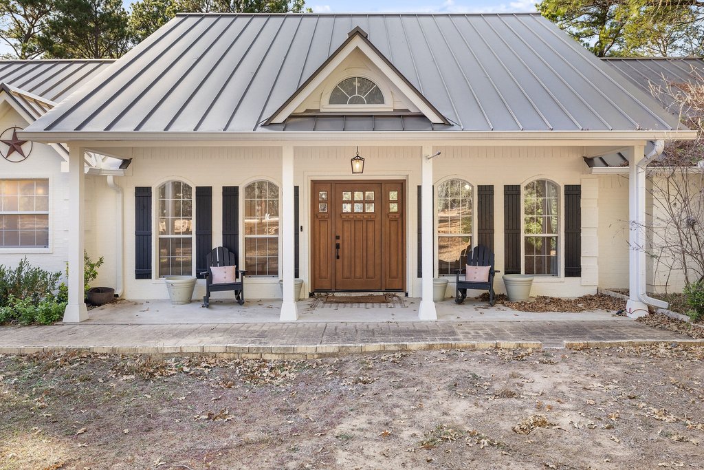 Welcome home!  Covered front porch perfect for rocking chairs and relaxing