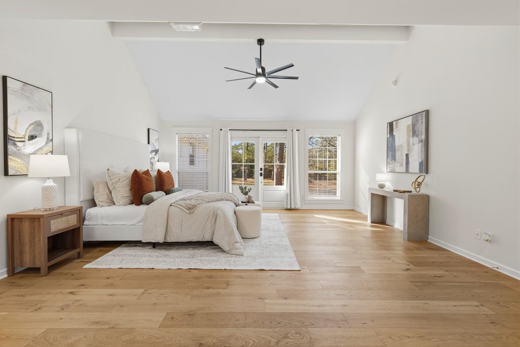 126 Pine View Loop Bastrop, TX 78602 - Photo 16 of 29 Expansive primary bedroom with vaulted ceilings