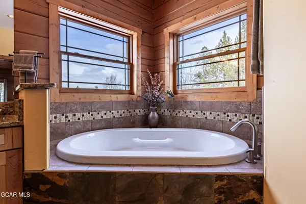 a aerial view of a house with a yard