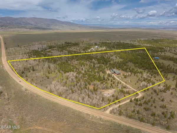 a large kitchen with stainless steel appliances granite countertop a large stove a sink and dishwasher