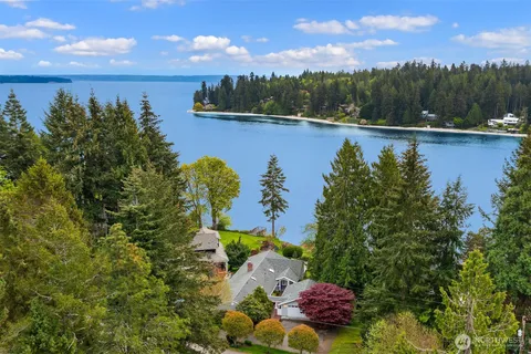a view of a lake with sitting area