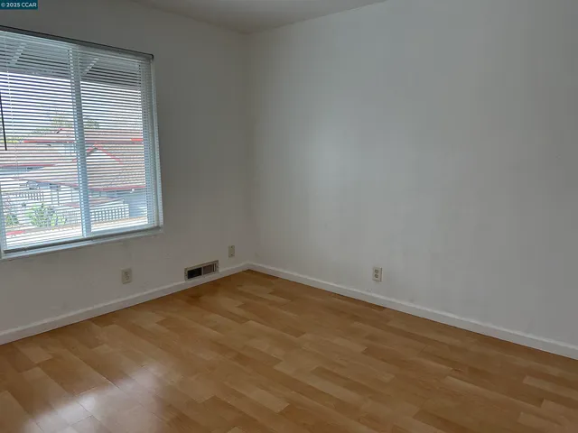 an empty room with a window