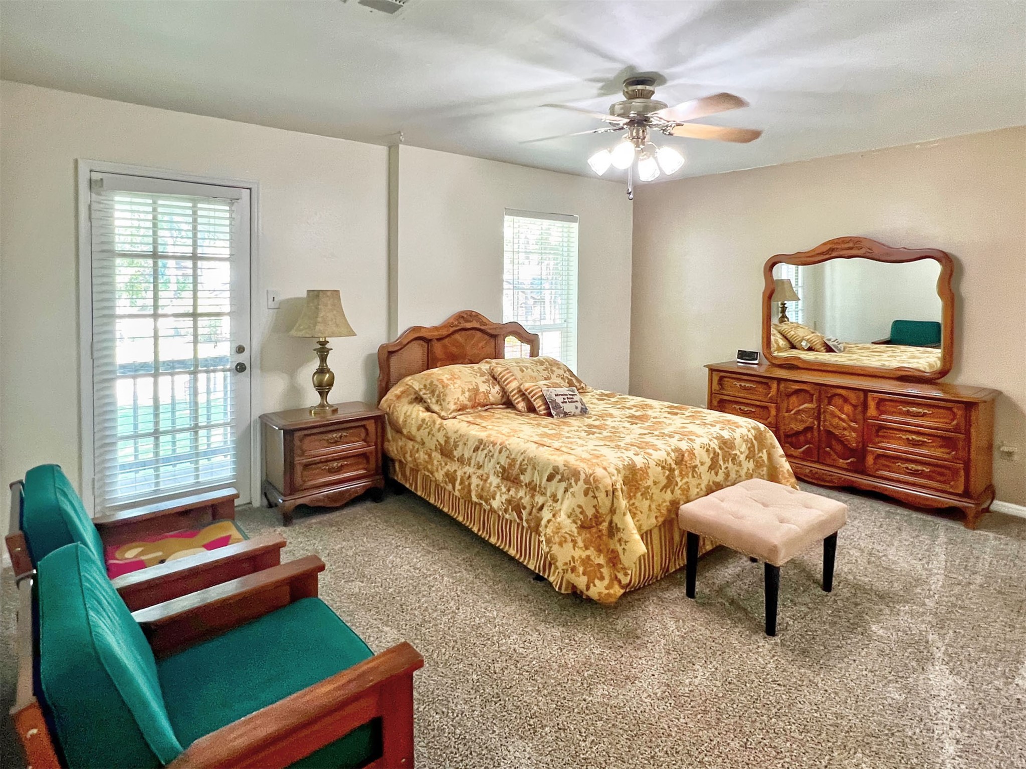 16902 Summit Oaks Lane Spring, TX 77379 - Photo 28 of 49 a bedroom with a bed and a couch
