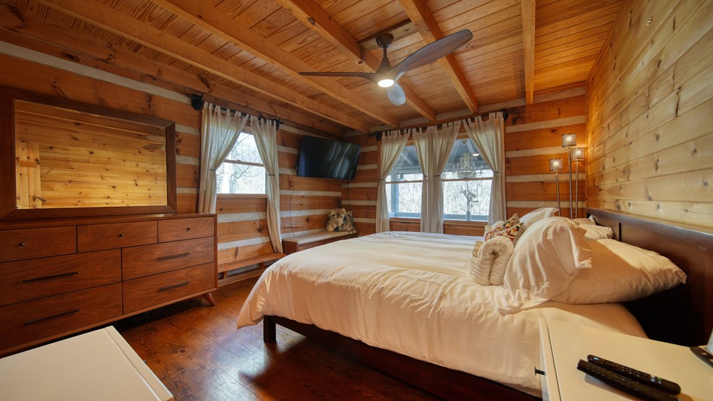 492 Chinkapin Drive Blue Ridge, GA 30513 - Photo 17 of 45 a bedroom with a bed and a window