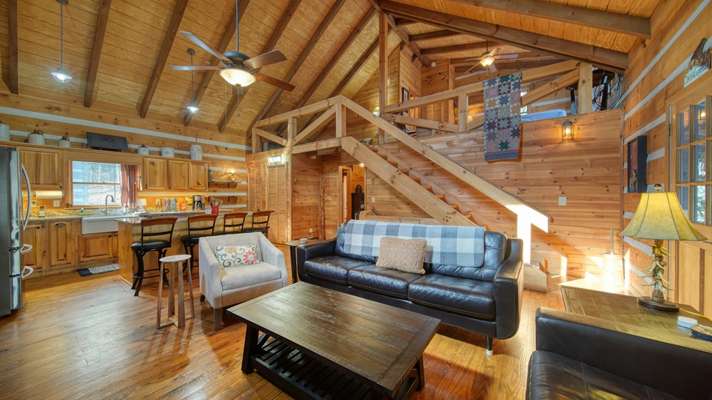 492 Chinkapin Drive Blue Ridge, GA 30513 - Photo 28 of 45 a living room with chairs and kitchen view