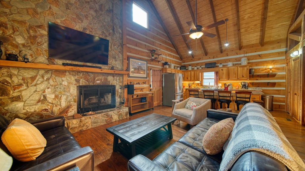 492 Chinkapin Drive Blue Ridge, GA 30513 - Photo 29 of 45 a living room with furniture and a fireplace