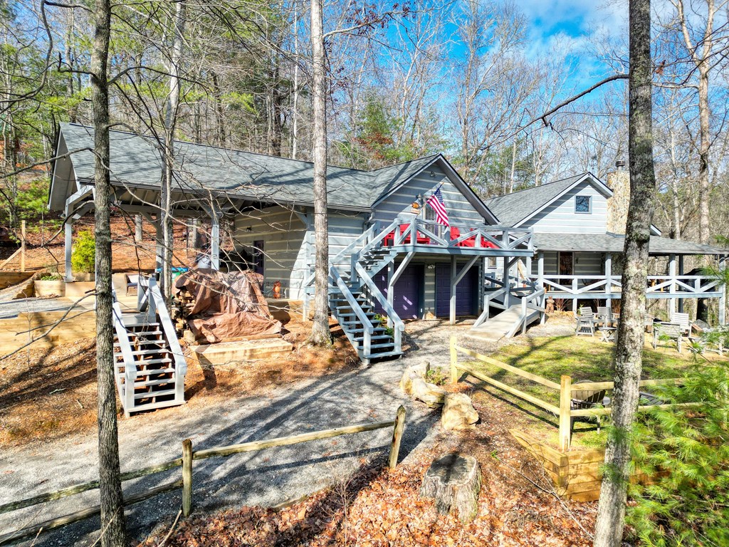 492 Chinkapin Drive Blue Ridge, GA 30513 - Photo 7 of 45 a view of a chairs and table in the patio