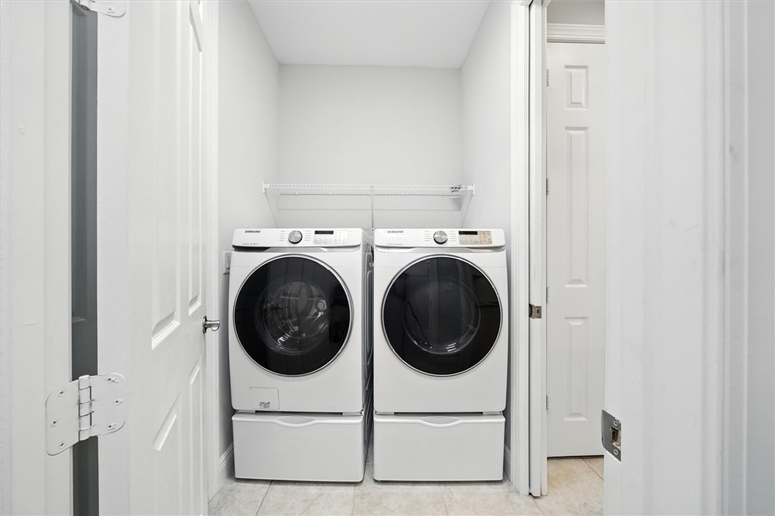 6096 Bella Rosa Lane Vero Beach, FL 32966 - Photo 20 of 33 a view of living room washer and dryer