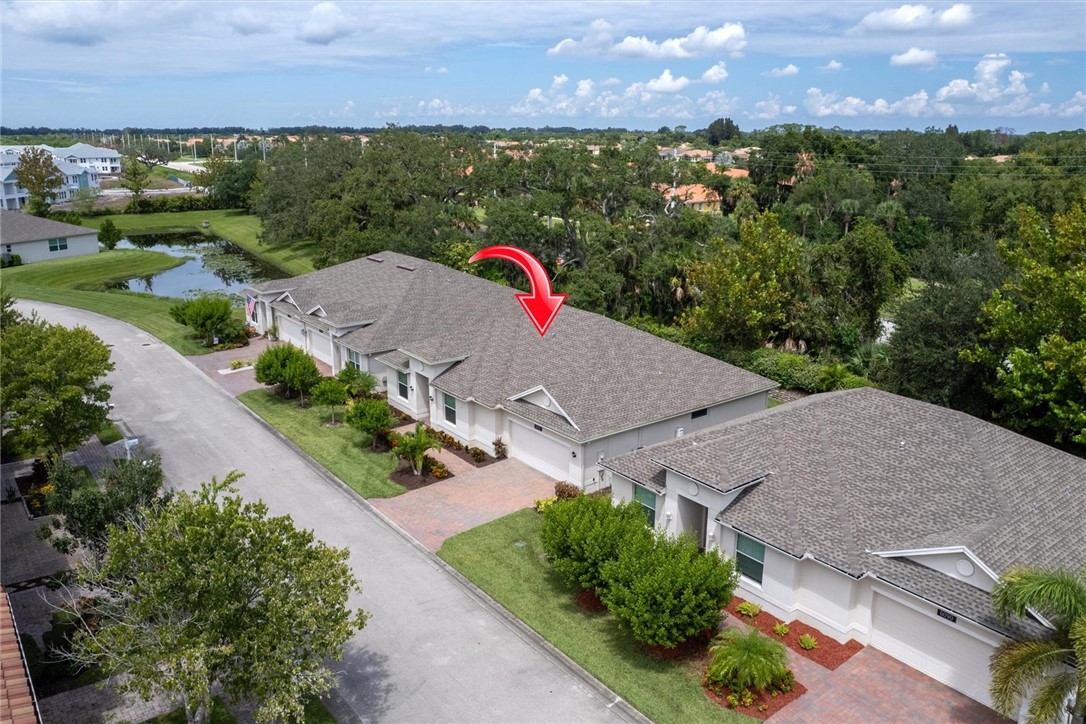 6096 Bella Rosa Lane Vero Beach, FL 32966 - Photo 28 of 33 an aerial view of a house