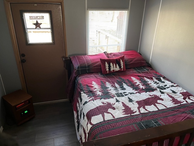 2795 East 28th Road Marseilles, IL 61341 - Photo 16 of 62 a bed sitting in a bedroom next to a window