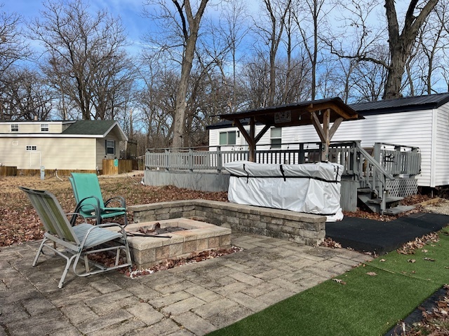 2795 East 28th Road Marseilles, IL 61341 - Photo 22 of 62 a view of a backyard with sitting area and furniture