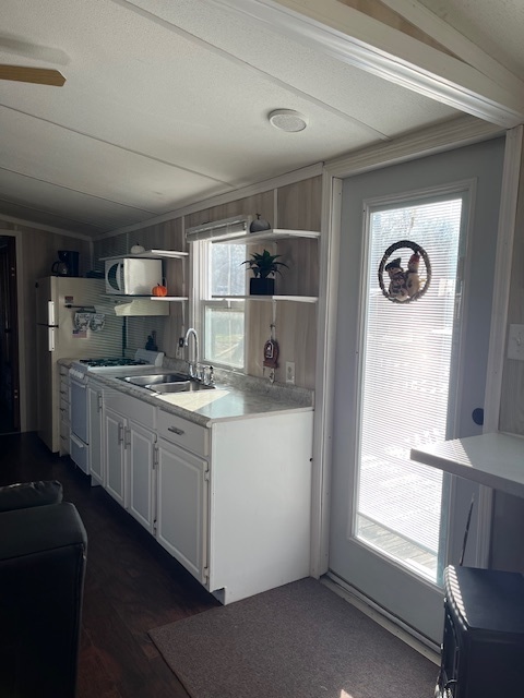 2795 East 28th Road Marseilles, IL 61341 - Photo 5 of 62 a kitchen with cabinets and window