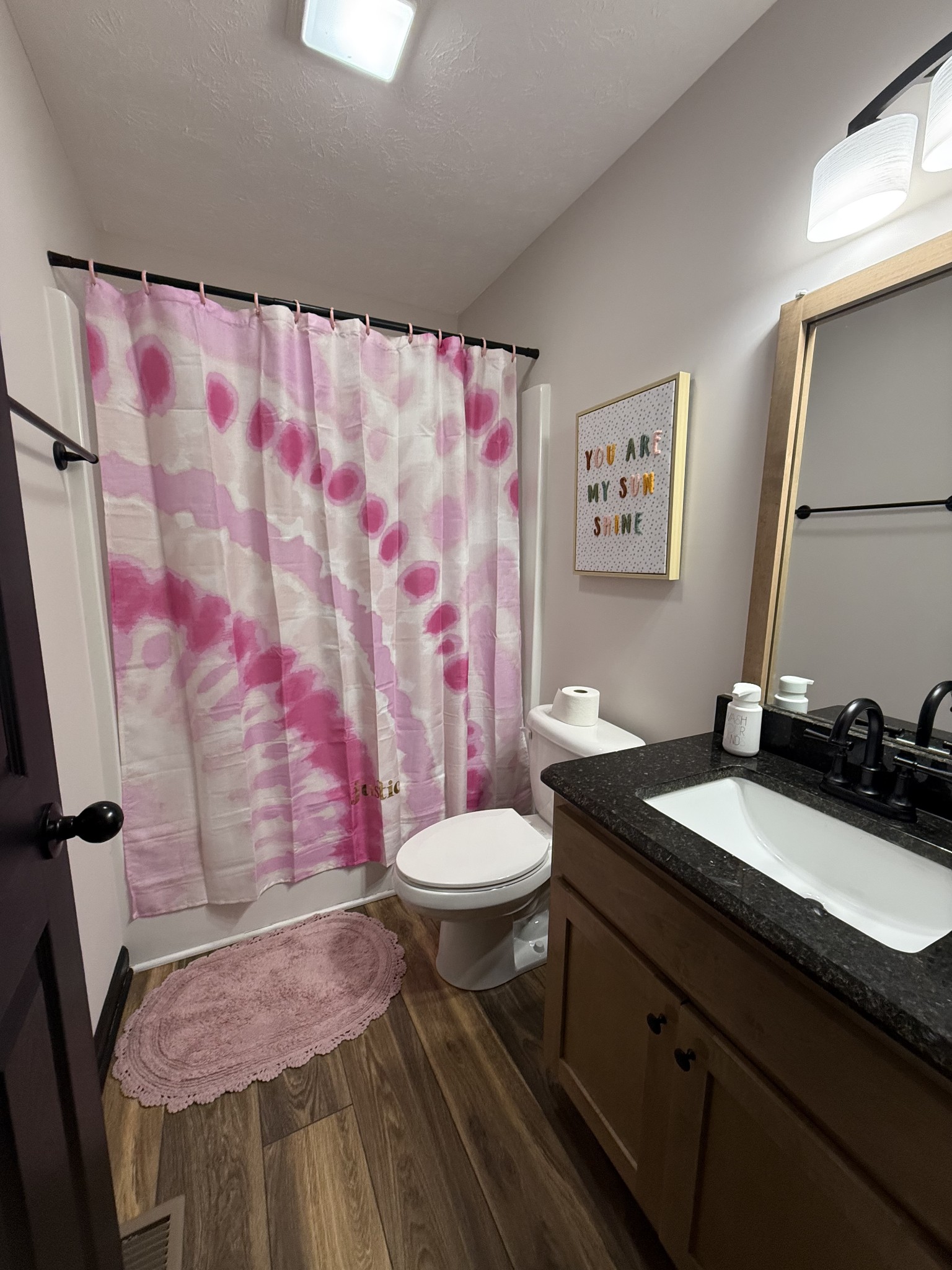 108 Checker Lane Lafayette, TN 37083 - Photo 12 of 15 a bathroom with a granite countertop sink and a mirror