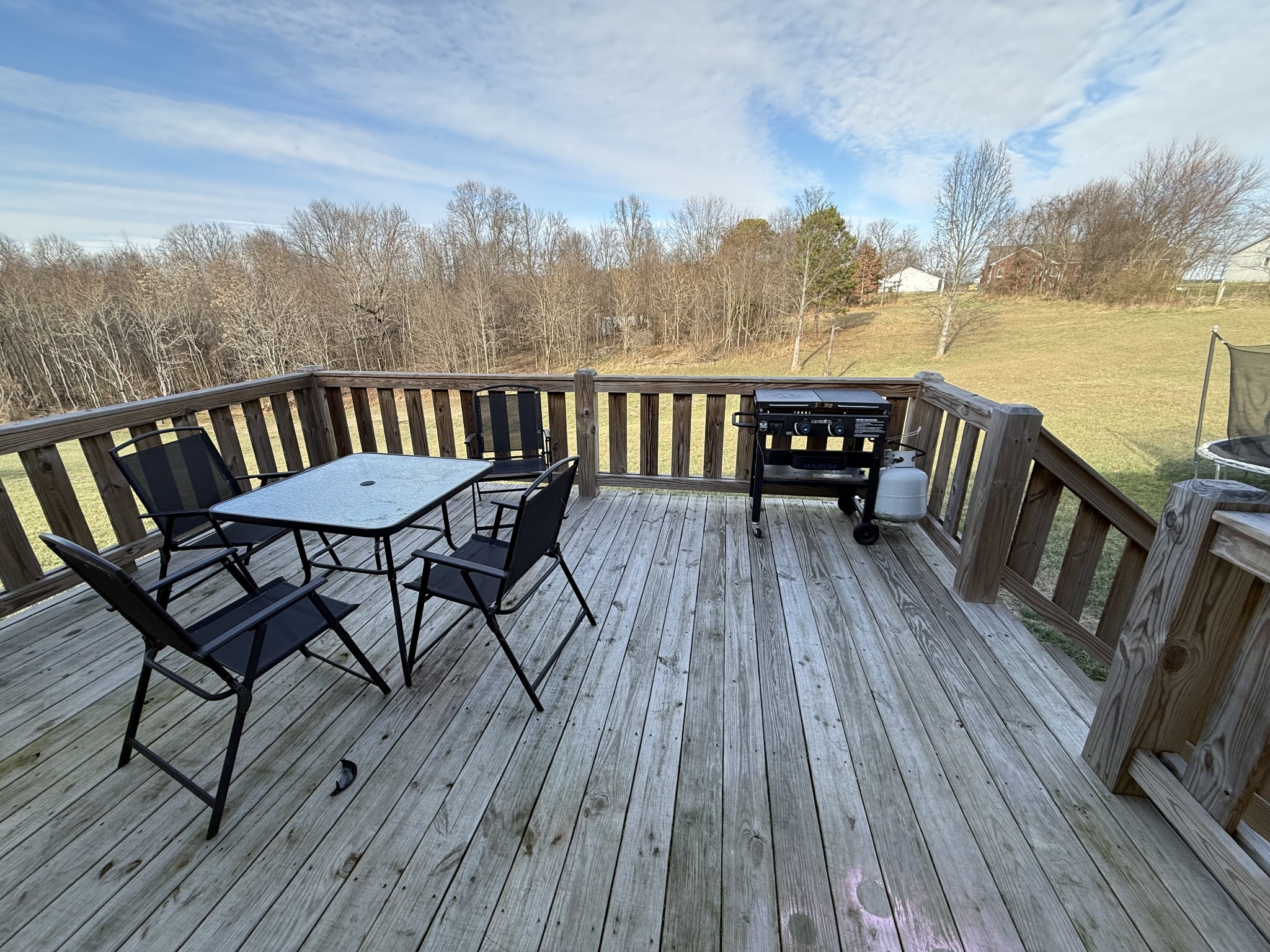 108 Checker Lane Lafayette, TN 37083 - Photo 14 of 15 a view of a balcony with furniture and wooden floor