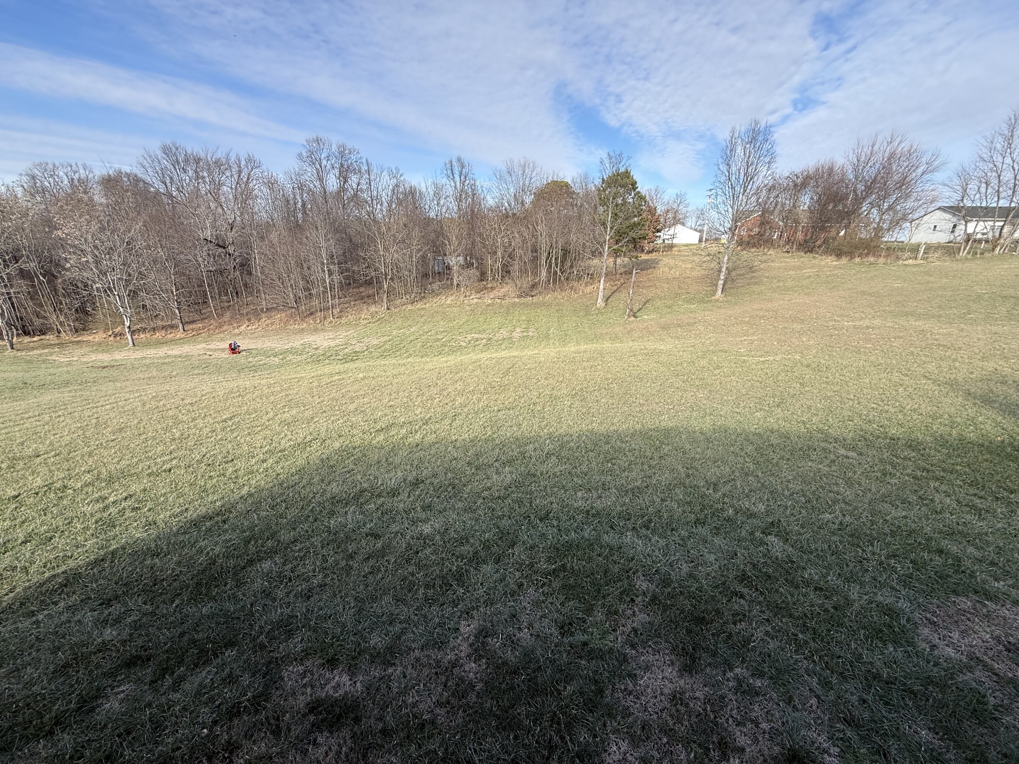 108 Checker Lane Lafayette, TN 37083 - Photo 15 of 15 a view of a field with trees in the background