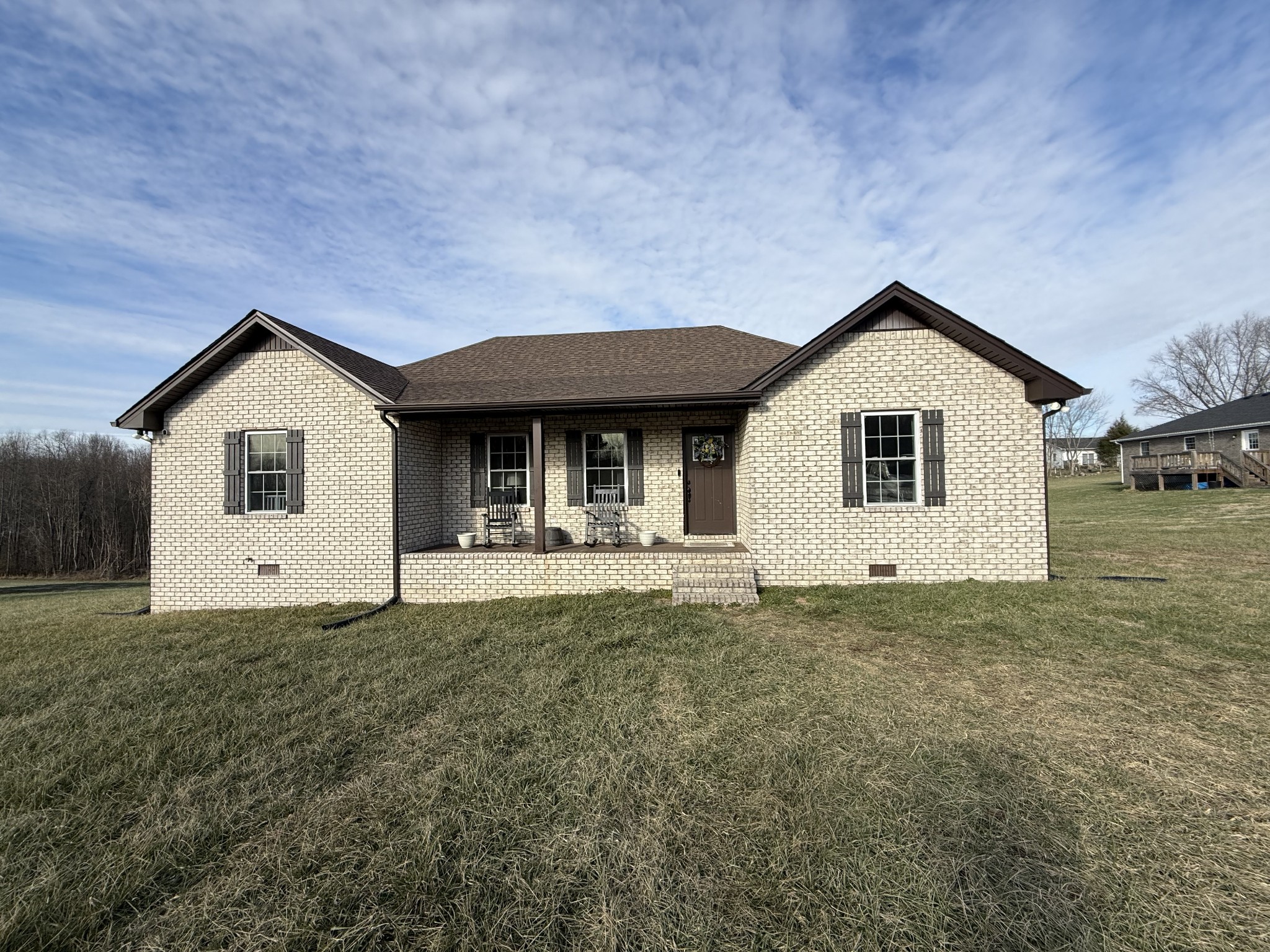 108 Checker Lane Lafayette, TN 37083 - Photo 2 of 15 a view of a house with a yard