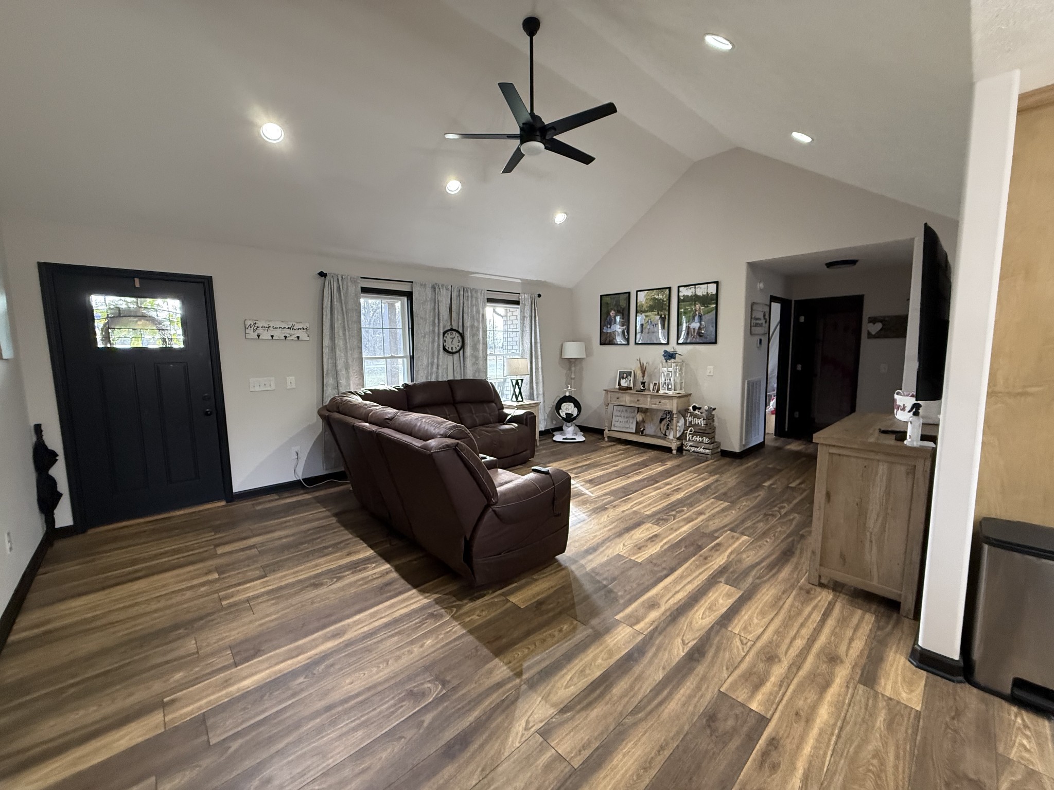 108 Checker Lane Lafayette, TN 37083 - Photo 4 of 15 a living room with furniture and a wooden floor
