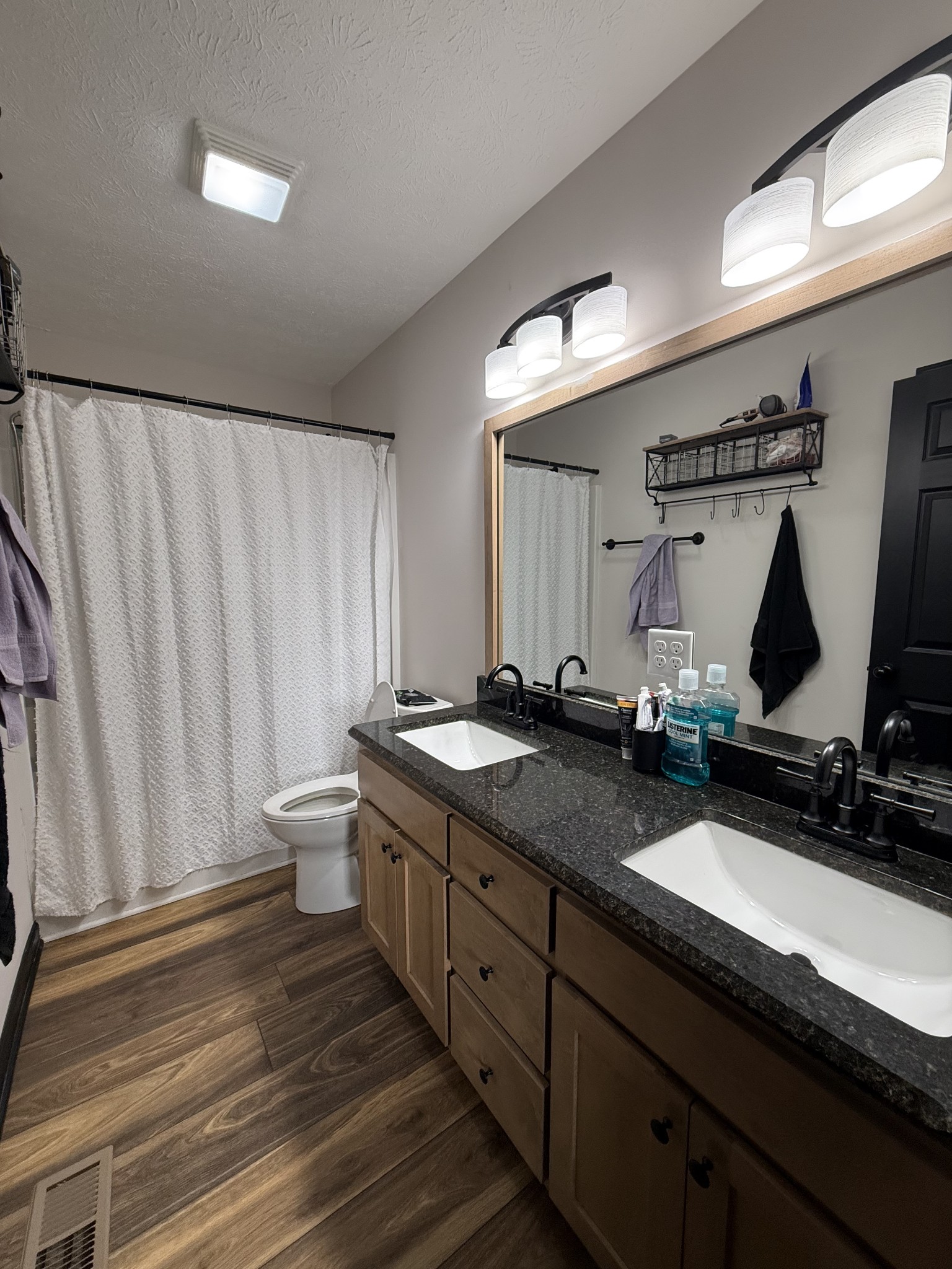 108 Checker Lane Lafayette, TN 37083 - Photo 10 of 15 a bathroom with double vanity and a mirror