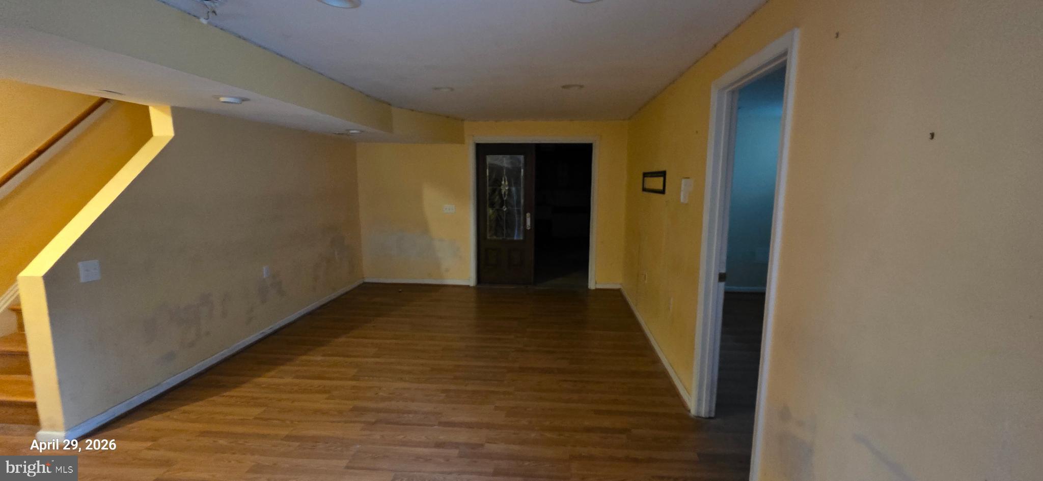 106 Sunlight Drive Frederick, MD 21702 - Photo 25 of 38 a view of a hallway with wooden floor
