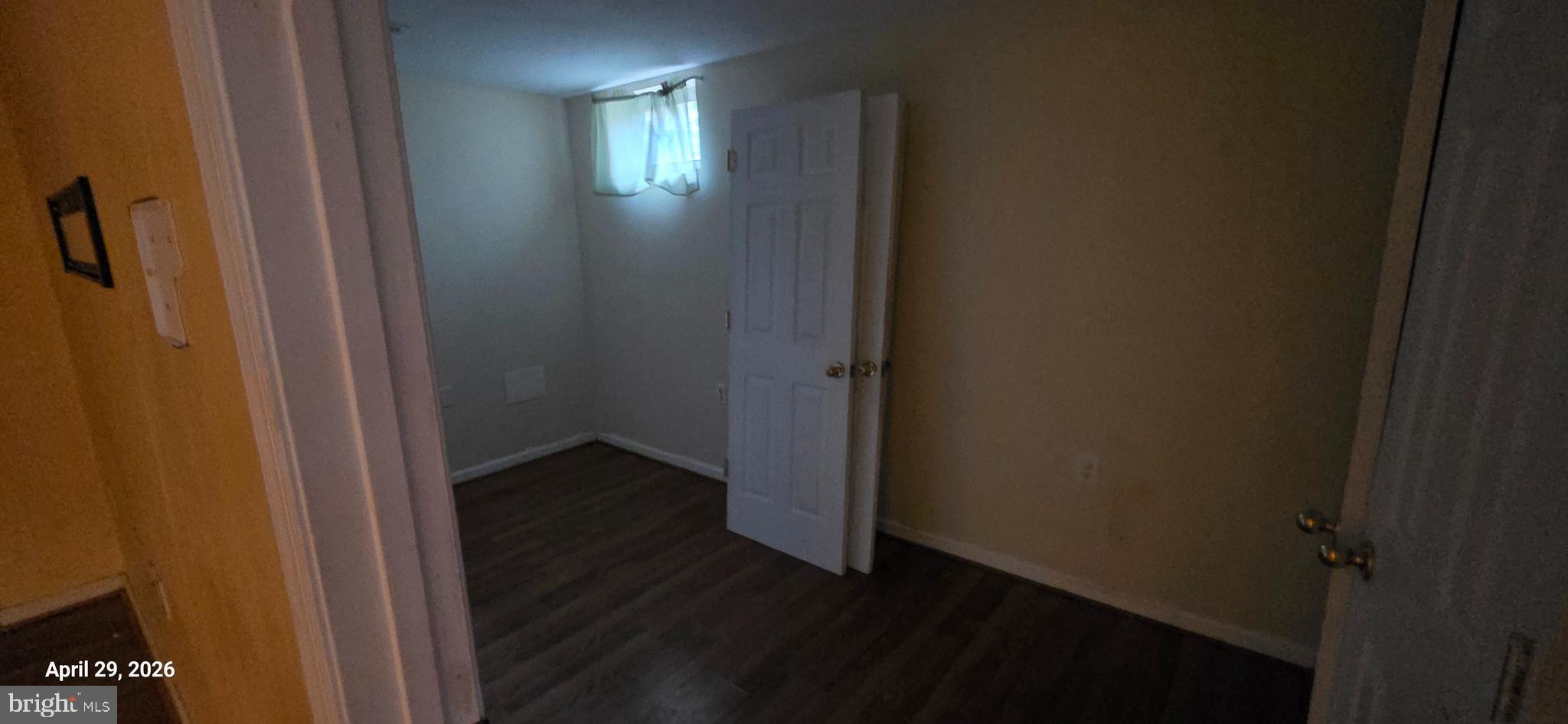 106 Sunlight Drive Frederick, MD 21702 - Photo 26 of 38 an empty room with wooden floor and windows