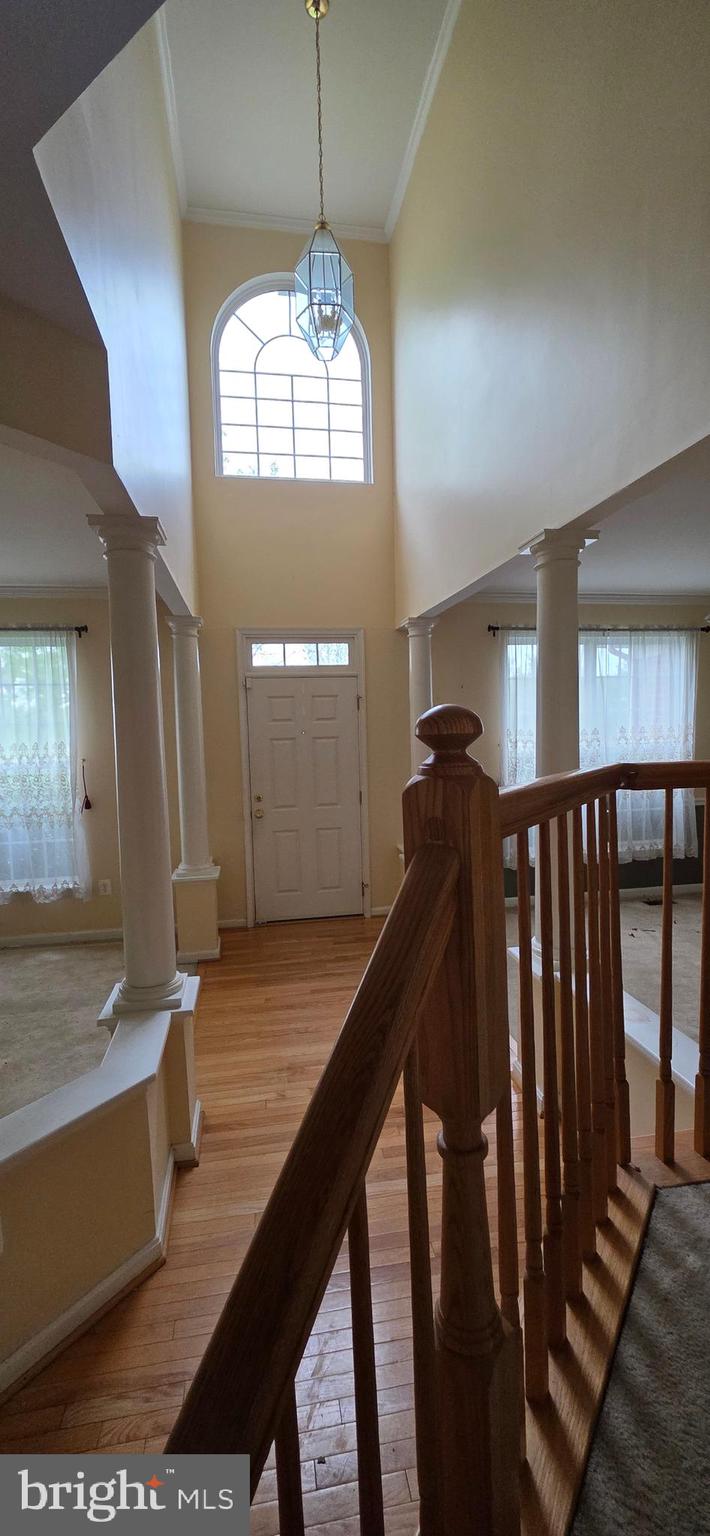 106 Sunlight Drive Frederick, MD 21702 - Photo 33 of 38 a view of a hallway with stairs
