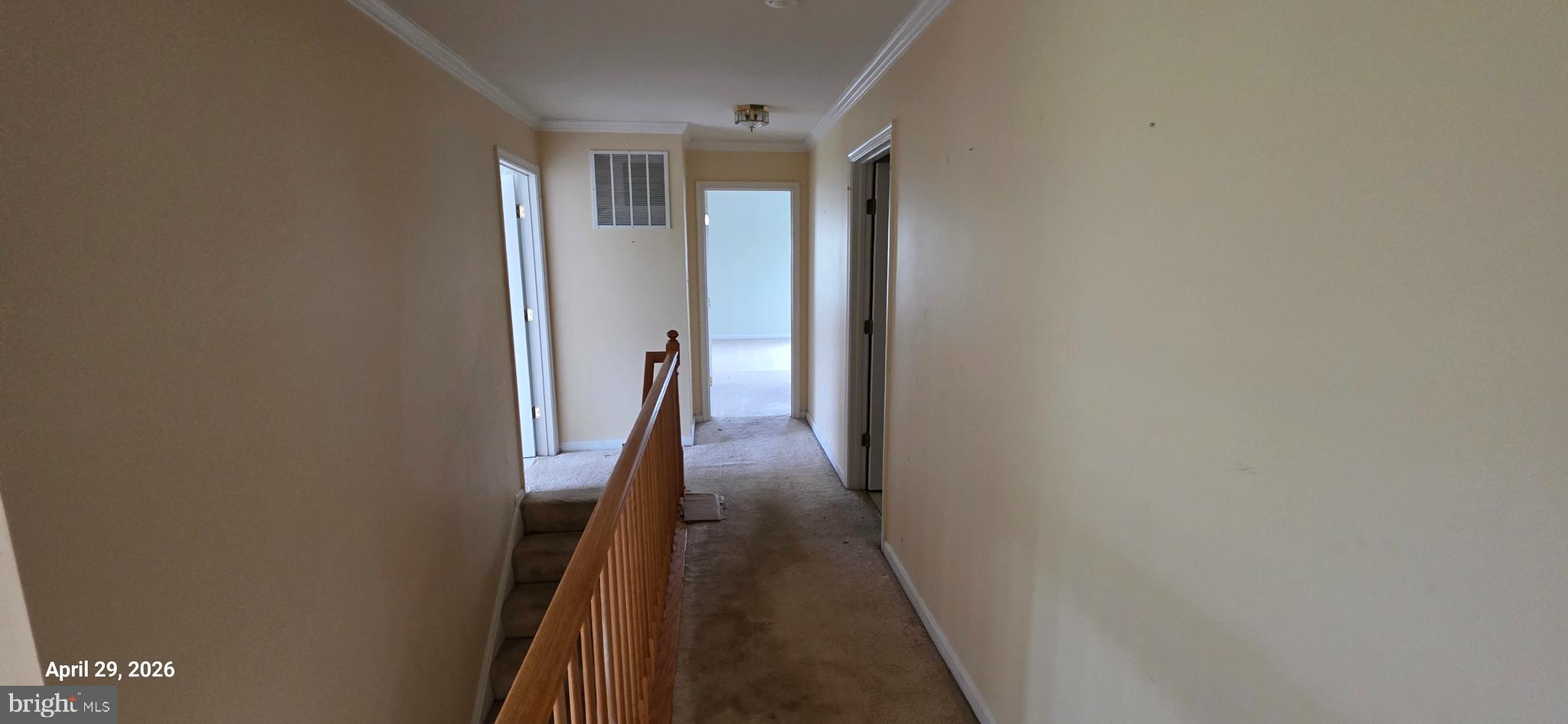 106 Sunlight Drive Frederick, MD 21702 - Photo 8 of 38 a view of a hallway with wooden floor