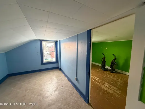 an empty room with windows