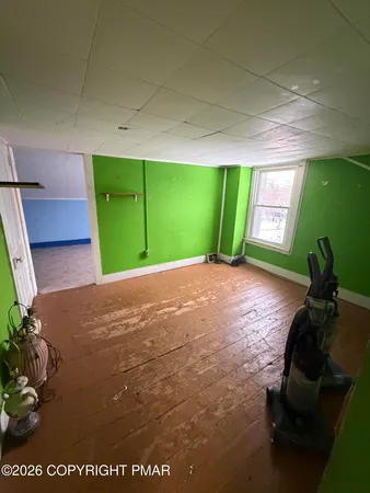a view of a back yard from a room