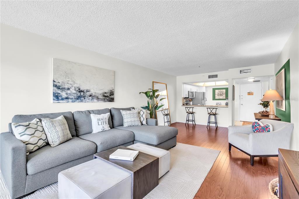 12200 Vonn Road, Unit 2206 Largo, FL 33774 - Photo 19 of 60 a living room with furniture and wooden floor