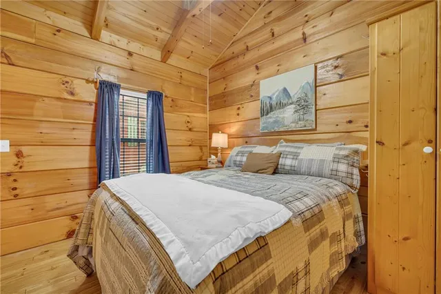 swimming pool with outdoor seating and garden