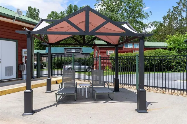 a view of a patio with a garden and patio
