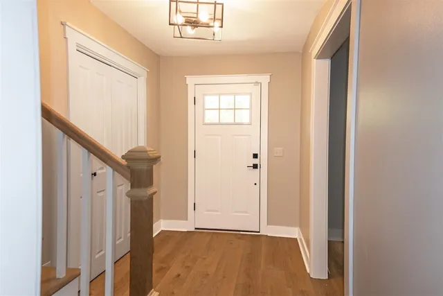 a view of an entryway with staircase