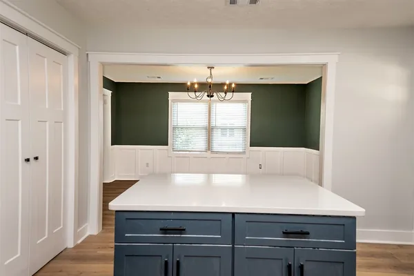 a bathroom with a sink and a window